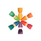 Wooden rainbow tomtens.  6 wooden carved people with cone shaped hats they are arranged in a snowflake shape